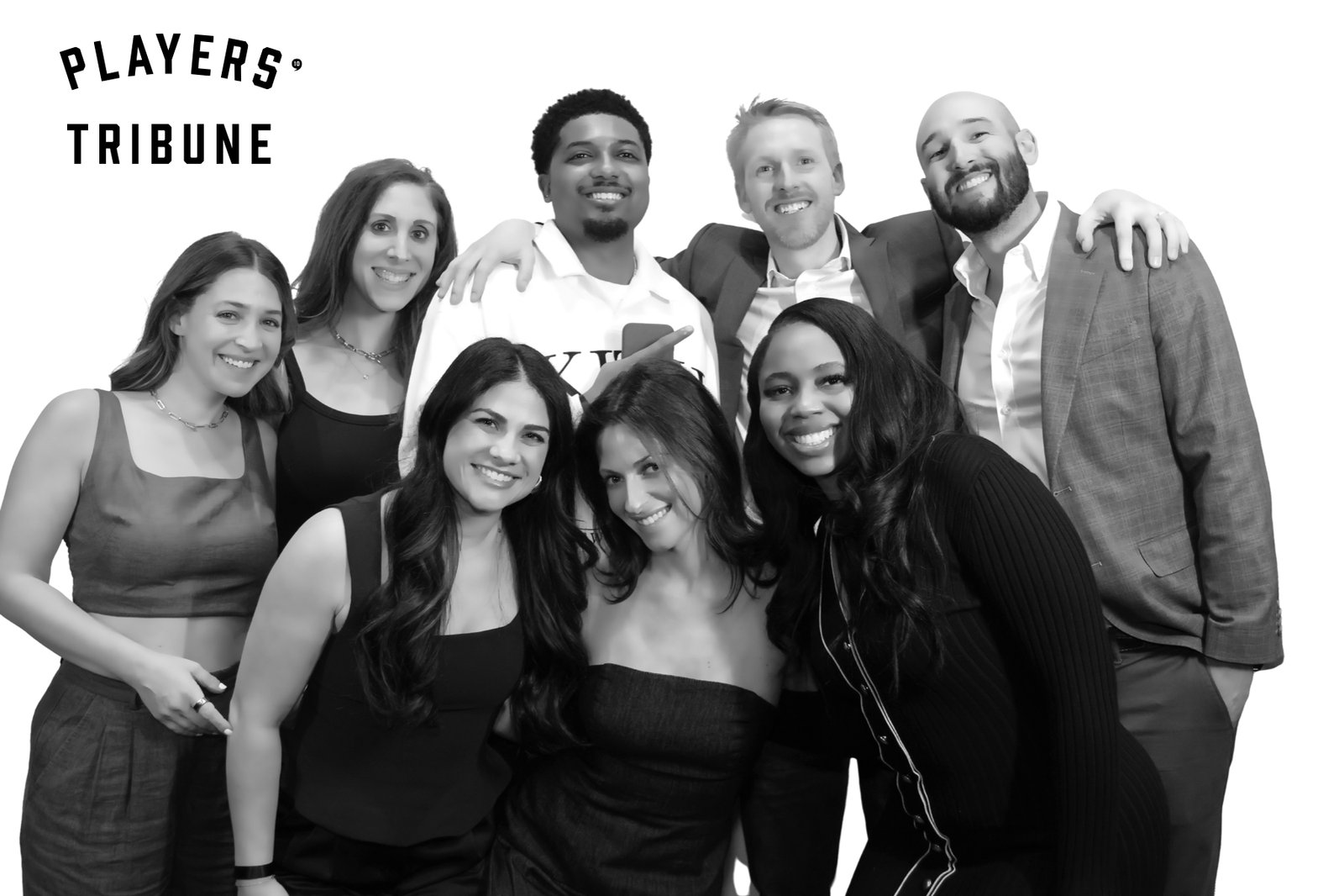 Black and white group portrait at a brand event