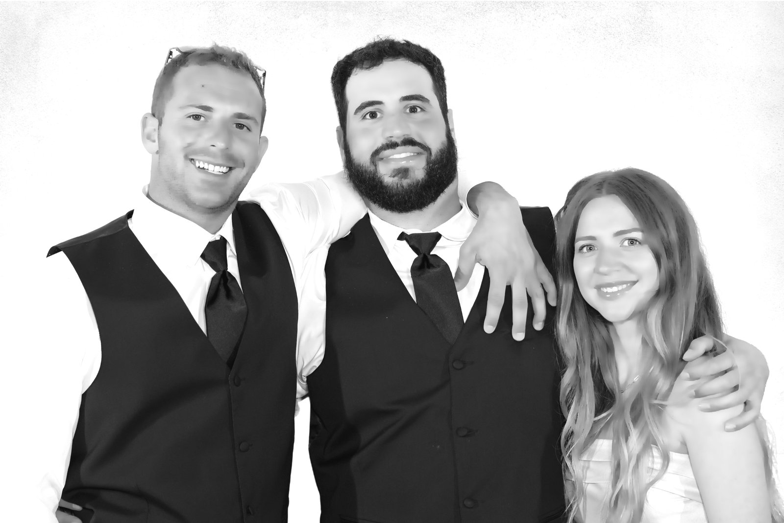 Black and white photo of groomsmen with a bridesmaid