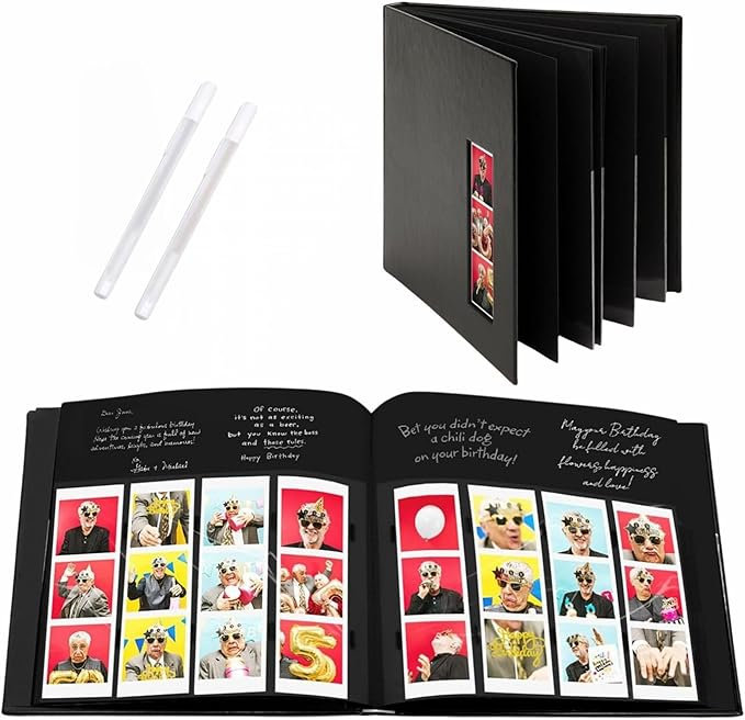 Black photo memory book open to pages of photo strips and handwritten notes