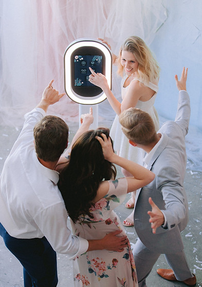 Guests using the iPad booth at an event