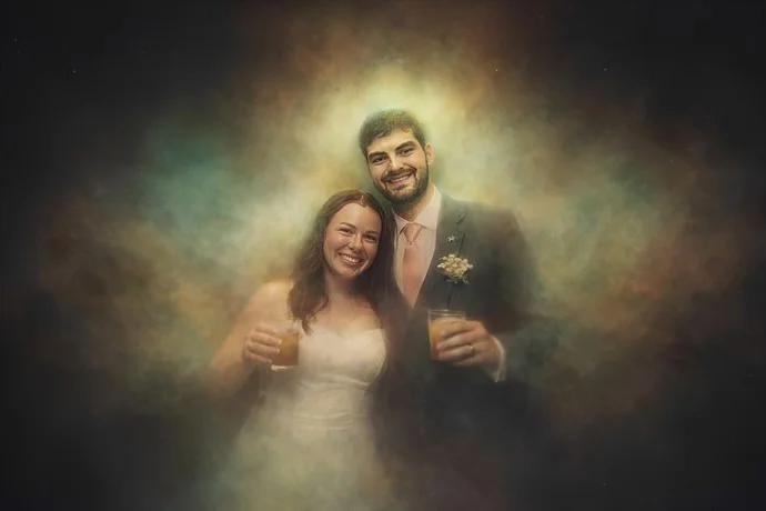 A couple surrounded by a glowing aura of color